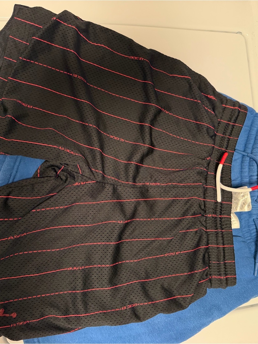 Jordan Black Mesh Shorts with Red Pinstripes and Blue Jordan Shorts